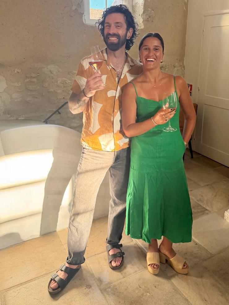 Trip Leaders Joey and Shauna toast to a great week on their Bordeaux & Dordogne Biking Trip.