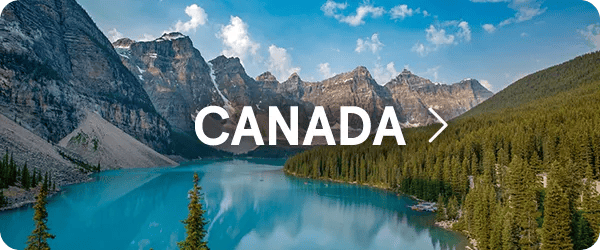 Scenic view of vibrant turquoise Moraine Lake surrounded by dense evergreen pine trees and rugged, snow-dusted mountains under a blue sky, with the word "CANADA" overlayed in white text in the center.