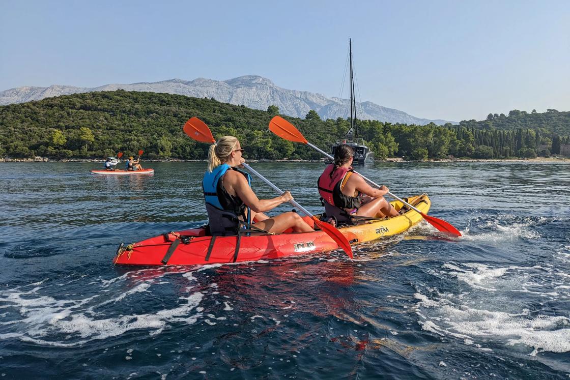 Kayaking along the sunny Croatian coast.