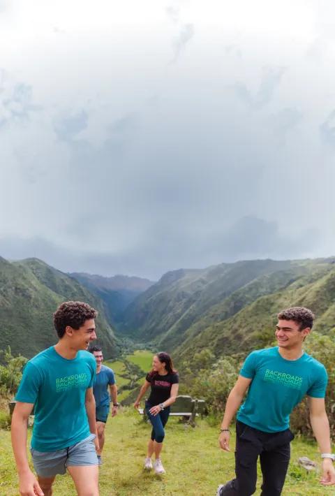 A family hiking in the Andes during a Backroads Galápagos & Andes Family Multi-Adventure Tour.