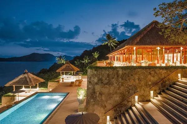 The clifftop Amankila luxury resort in Manggis, Karangasem Regency, Bali, Indonesia, overlooking the Lombok Strait.