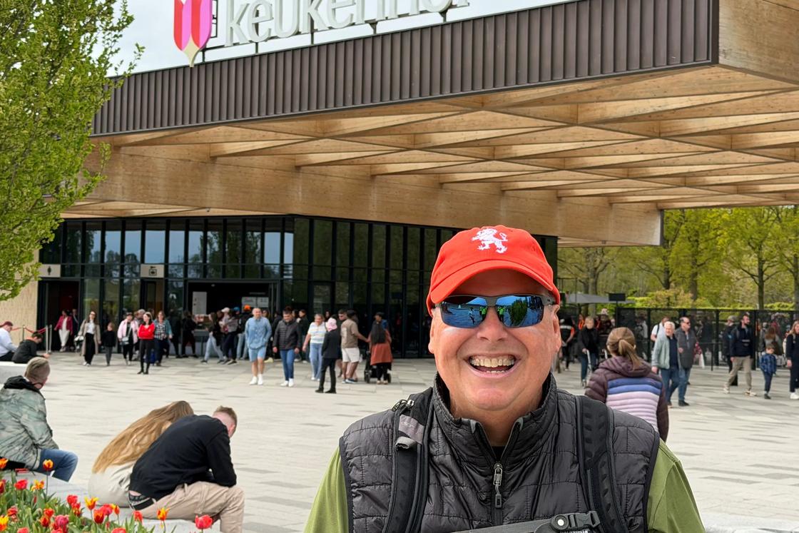 Backroads guest Mark Hieber in front of the entrance to Keukenhof gardens.