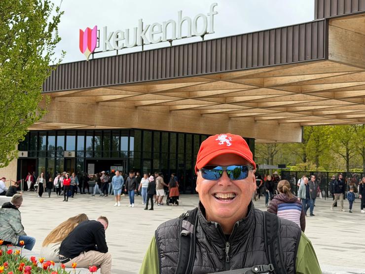 Backroads guest Mark Hieber in front of the entrance to Keukenhof gardens.