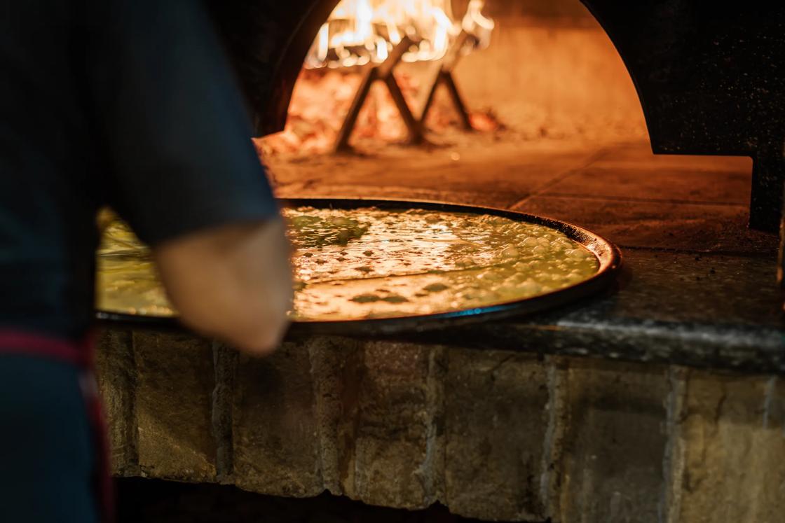 The Farinata, a typical wooden oven Italian recipe based on  chickpea flour.