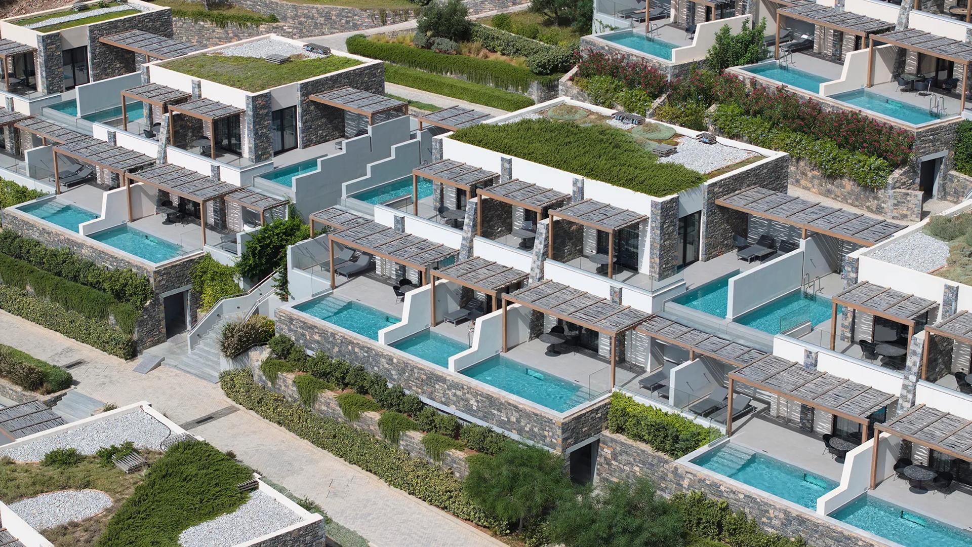 Private pools and terraced architectural style of the Cayo Exclusive Resort & Spa in Crete.