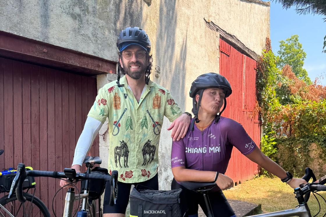 Joey and Shauna, two Backroads Trip Leaders, pose with their bikes on a trip.