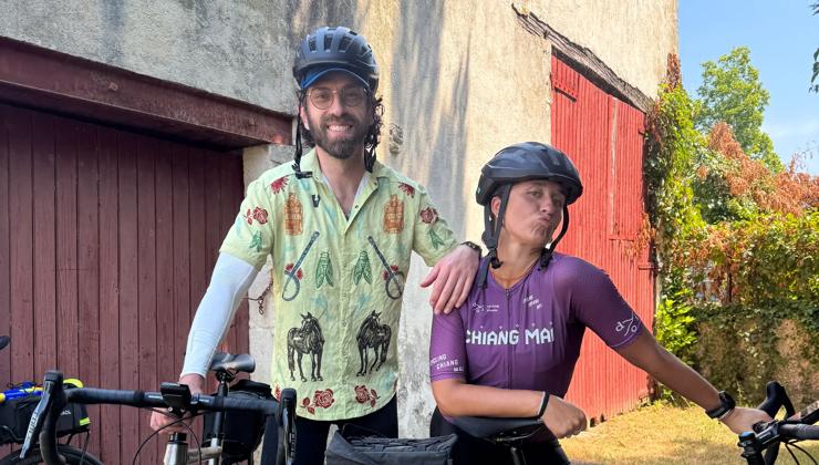 Joey and Shauna, two Backroads Trip Leaders, pose with their bikes on a trip.