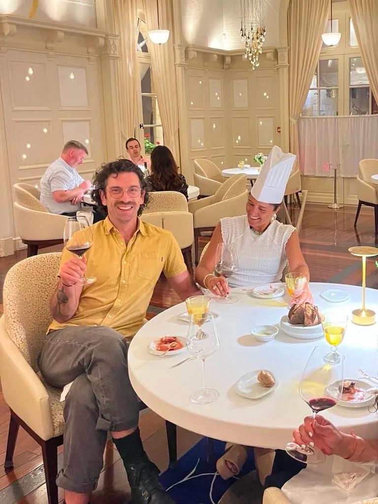 Backroads Trip Leaders Joey and Shauna enjoy their dinner on the Bordeaux & Dordogne Biking Trip.