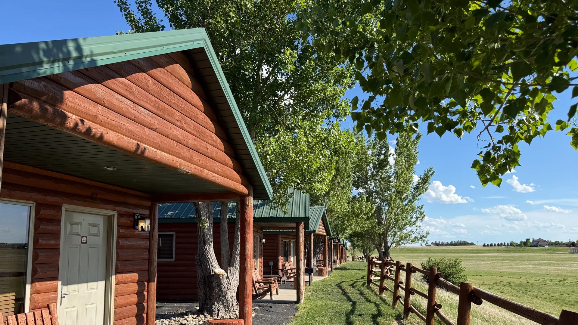 Custom-built log cabins at the Badlands Frontier Cabins located in Wall, South Dakota, near Badlands National Park.
