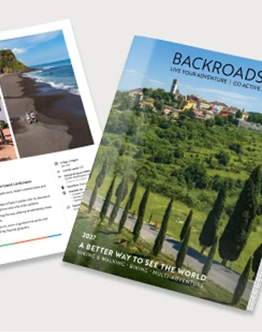The 2027 Backroads catalog, titled "A Better Way to See the World," featuring biking, hiking, walking, and multi-adventure trips.